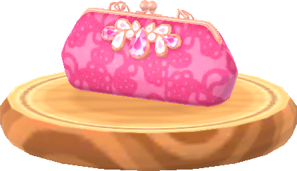 bolso rosa con joyas